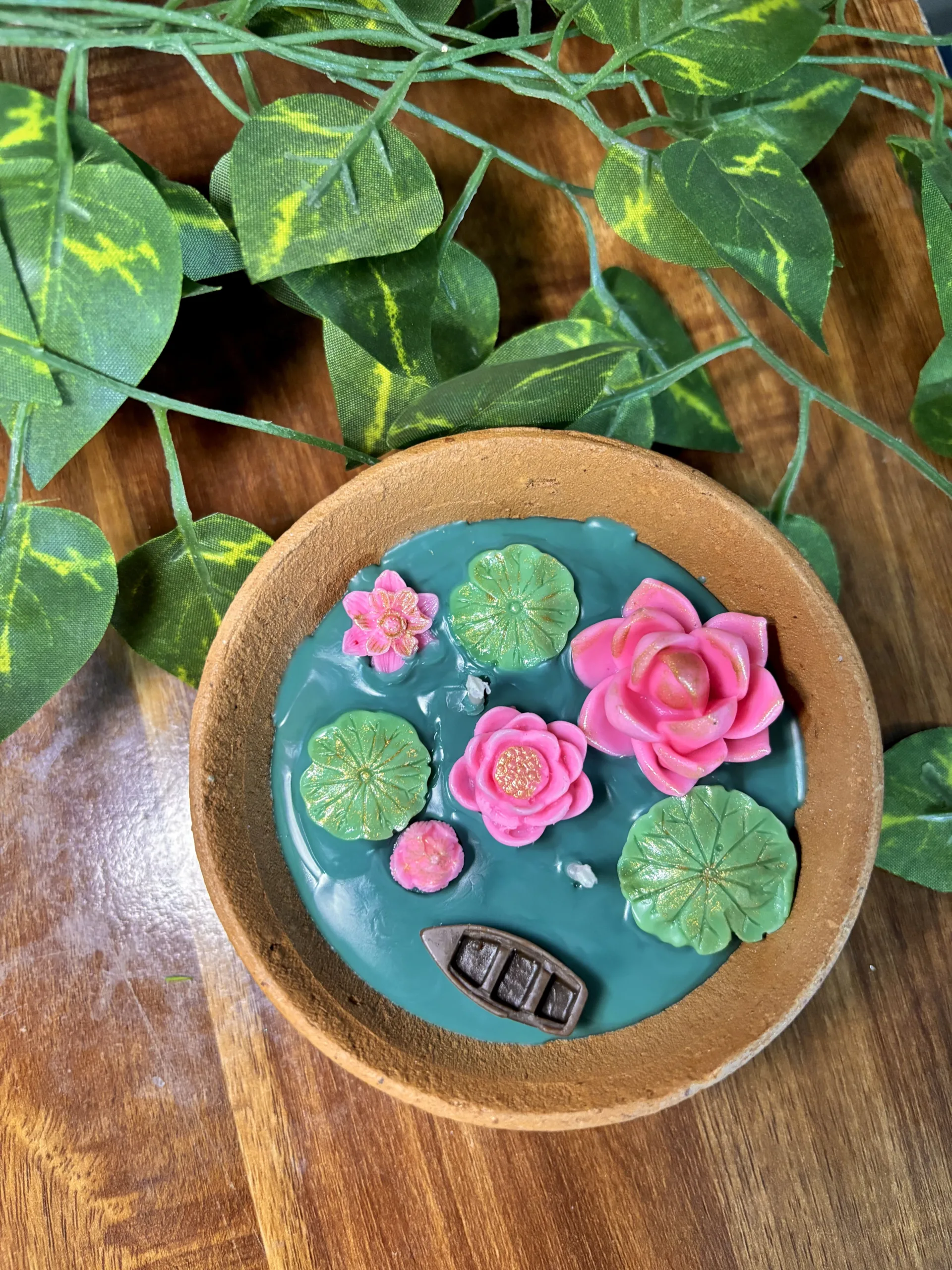 Lotus pond terracotta diya